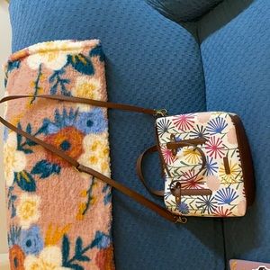 Fossil crossover body bag.